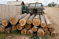 Felled tree trunks and a Soviet truck in Khuzhir Village on Olkhon Island in Lake Baikal, Siberia