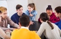 Fellow students playing Mafia game at recess Royalty Free Stock Photo