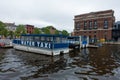 Fells Point, Baltimore Maryland, USA - May 26, 2022. Waterfront buildings and water taxi in Fells Point Baltimore, Maryland in the Royalty Free Stock Photo