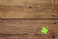 Felt clover leaf on old wooden background. Good luck symbol, St.Patrick`s Day concept Royalty Free Stock Photo