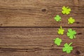 Felt clover leaves on old wooden background. Good luck symbol, St.Patrick`s Day concept Royalty Free Stock Photo