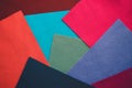 Felt color textile. Samples of soft felt flaps in different colours. Fan of colored bright textile material. Felt craft abstract