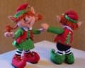 Felt decoration in retro style - dansing christmas elves. Cute close-up of christmas toys. Happy new year hand made