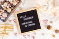 Felt letter board with text hello december, Christmas is coming and xmas decoration