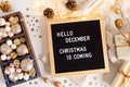 Felt letter board with text hello december, Christmas is coming and xmas decoration