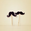 Felt mustaches in sticks, retro effect