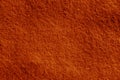 Felt surface in orange color. Royalty Free Stock Photo