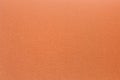 Felt surface in orange color. Abstract background and texture Royalty Free Stock Photo