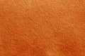 Felt texture background in orange color. Royalty Free Stock Photo