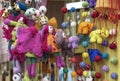 Felt toys. Bright woolen toys in the showcase of a gift shop