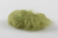 Felt wool moss green color swatch. Shallow depth of field. Royalty Free Stock Photo