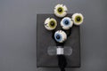 Felted eyeballs with pupils of different colors