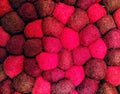 Felted red woolen balls. Original knitted thick napkin for hot. Wattled carpet. Needlework. Handmade.