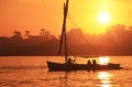 Felucca boat sailing on the Nile river at sunset, Luxor Royalty Free Stock Photo