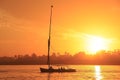 Felucca boat sailing on the Nile river at sunset, Luxor Royalty Free Stock Photo