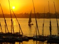 Felucca boats at the harbor at sunset, Luxor Royalty Free Stock Photo