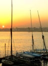 Felucca boats at the harbor at sunset, Luxor Royalty Free Stock Photo