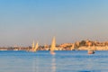 Felucca boats sailing on the Nile river in Luxor, Egypt. Traditional Egyptian sailing boats Royalty Free Stock Photo