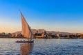 Felucca boats sailing on the Nile river in Luxor, Egypt. Traditional Egyptian sailing boats