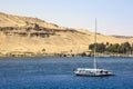 Felucca river boat on the Nile, with the Sahara behind in Aswa Royalty Free Stock Photo