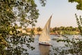 A felucca, a traditional wooden sailing boat, on the Nile River Royalty Free Stock Photo