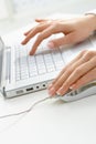 Femal hands using laptop Royalty Free Stock Photo