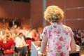 Female academic professor lecturing. Royalty Free Stock Photo