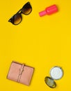 Female accessories on a yellow background. Products for beauty and fashion.
