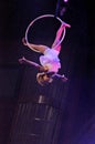 Female aeralist in circus flying