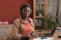 Female African-American Musician Smiling at Camera