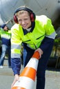 Female airport ground worker smiling Royalty Free Stock Photo