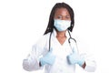 Female american african doctor, nurse woman wearing medical coat with stethoscope, mask and hand in gloves show like. Happy Royalty Free Stock Photo