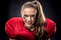 Female american football player in uniform Royalty Free Stock Photo