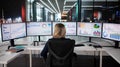 Female Analyst Monitoring Data Dashboard