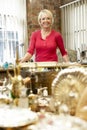 Female antique shop proprietor