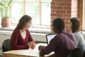 Female applicant having interview in modern office