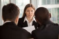 Female applicant introducing herself during job interview, talki Royalty Free Stock Photo