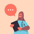 female arab doctor in uniform holding clipboard chat bubble communication healthcare medicine concept