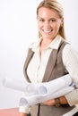 Female architect blueprints smiling hold Royalty Free Stock Photo