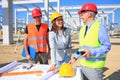 Female architect and construction engineers on construction site Royalty Free Stock Photo