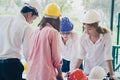 Female Architect and engineer working together at construction area