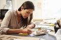 Female Architect Making Model In Office Royalty Free Stock Photo