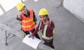 Female architect and male contractor working together on projects Royalty Free Stock Photo