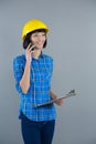 Female architect talking on mobile phone Royalty Free Stock Photo