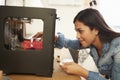 Female Architect Using 3D Printer In Office Royalty Free Stock Photo