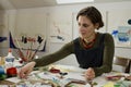 Female artist in her studio Royalty Free Stock Photo