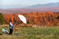 Female artist painting fall foliage, New Hampshire Royalty Free Stock Photo