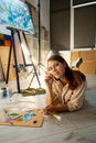 female artist painting school creating artwork