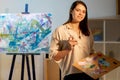 female artist painting school creating artwork