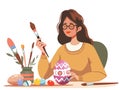 Female artist paints an easter egg. Flat illustration for web. Young woman at work. Isolated on white background Royalty Free Stock Photo